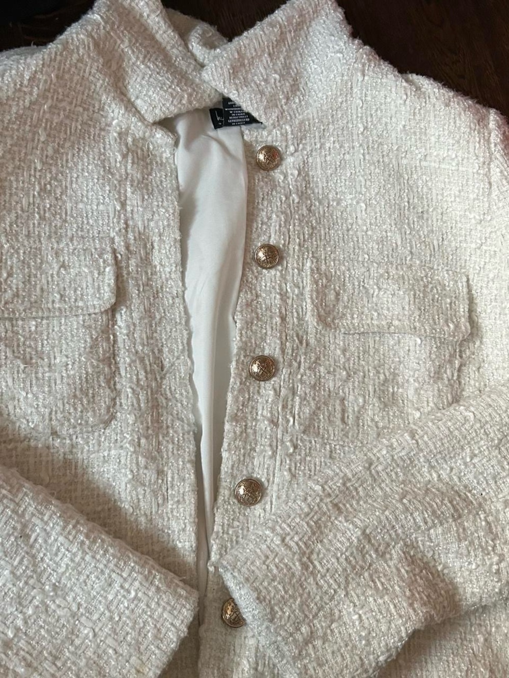 Nicole Miller White Garment with Black Brand Label